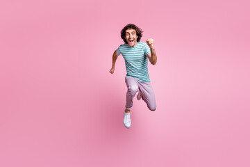 Wall Mural - Full length photo of hurrying young gentleman wear casual outfit jumping running isolated pastel color background