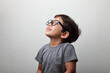 © AJay - Little boy wearing big eye wear looking up
