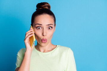 Poster - Close-up portrait of her she nice attractive lovely charming gorgeous stunned girl talking on phone pout lips incredible news isolated bright vivid shine vibrant blue color background