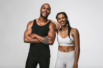 Wall Mural - Portrait of smiling fitness couple