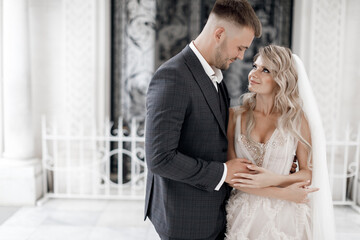 portrait of a happy bride and groom, wedding love emotions