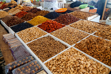 Dried fruits and nuts at the Chorsu Bazaar in Tashkent, Uzbekistan. Superfood, vegetarian food.