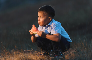 Wall Mural - boy eating watermelon