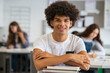 © Rido - Portrait of black guy in high school class
