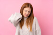 © luismolinero - Young redhead woman over isolated pink background with neckache