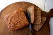 © Andrew Scrivani - Overhead view of cracked wheat bread on cutting board