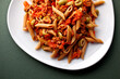 © Andrew Scrivani - Pasta with spicy sausages, tomatoes, rosemary and olives