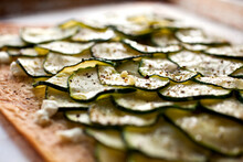 Close Up Of Lavash Pizza With Zucchini And Goat Cheese Topping