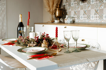 Beautiful table setting with Christmas decorations in living room