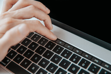 Wall Mural - close up. man using the optional touch panel of his laptop.