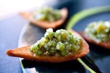 Close Up Of Chip With Roasted Tomatillo Salsa