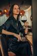 © eastwest photo - woman with glass of wine