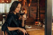 © eastwest photo - elegant woman tasting wine
