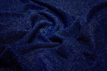 Wall Mural - Background from dark blue jersey with lurex. Close-up knitted fabric texture.