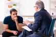 © Elnur - Young man visiting old male psychologist