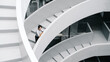© JIACHUAN LIU/Stocksy - Businessman Using Smartphone On Stairs