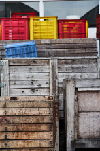 Stack Of Shabby Boxes In Port