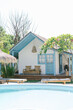 © Dreamwood Photography/Stocksy - Tropical beach house with swimming pool