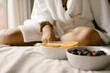 © Melissa Alexander/Creative Flame - Friends having a girls weekend relaxing at house