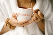 © Melissa Alexander/Creative Flame - Woman drinking coffee at home in bed