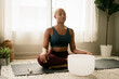 © Melissa Alexander/Creative Flame - Black woman meditating at home