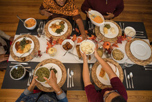 Overhead View Of Black Hands Eating Thanksgiving Holiday Meal