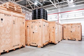 wooden boxes in the warehouse. boxes out of wood for packing industrial machinery. warehousing. pack