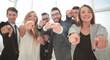 © ASDF - close up.a group of young business people pointing at you