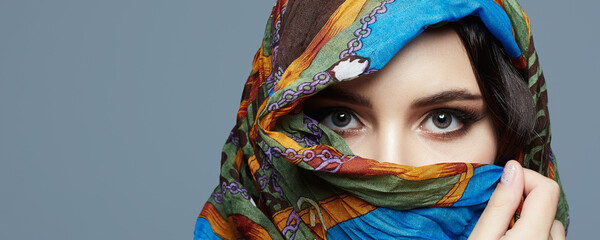 beautiful woman in color veil. beauty girl in colorful hijab