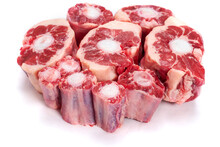 Pile Of Fresh Raw Ox Tail Portion On White Background. Meat Industry Concept