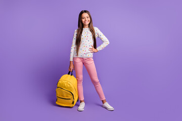 Sticker - Full length body size photo of nice lovely schoolgirl keeping yellow rucksack wearing casual outfit isolated on bright purple background