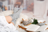 Fototapeta Koty - cocoa, hot chocolate, book, cosy in the wintertime