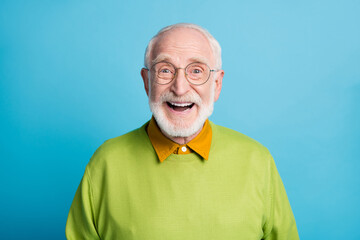 photo of retired old man open mouth shiny smile excited wear glasses green pullover isolated blue co