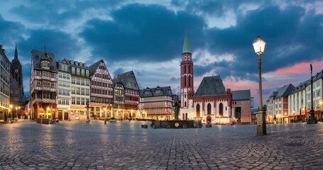 Wall Mural - Frankfurt, Germany. Romerberg - historic market square with german timber houses (static image with animated sky)
