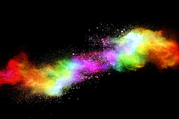 Wall Mural - explosion of colored powder on black background.