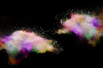Wall Mural - explosion of colored powder on black background.