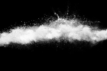 White powder explosion isolated on black background.