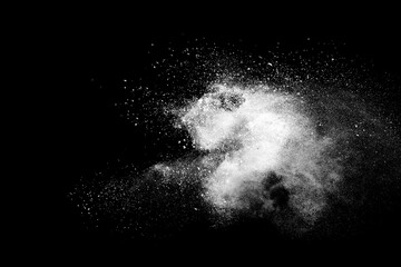 Wall Mural - white powder explosion isolated on black background.