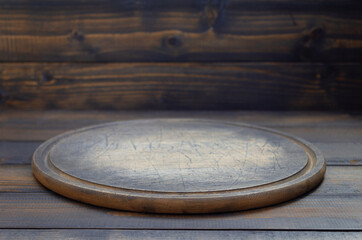 Poster - pizza cutting board at wooden table