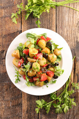 potato salad with tomato and olive