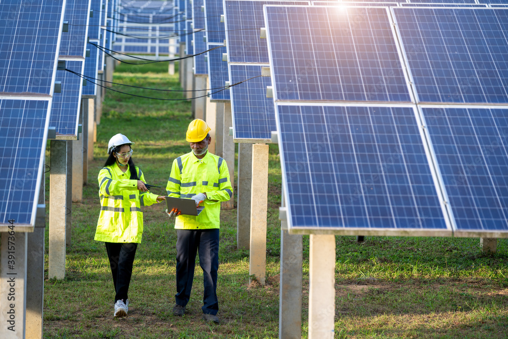 Solar Infrastructure Developer Engineers with architects examining solar power plant,Solar station ...