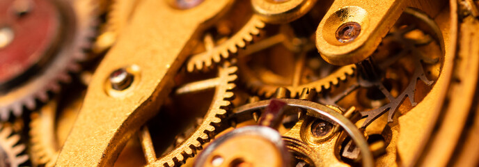 Close up of a 100 years old pocket watch mechanism. Cogwheels