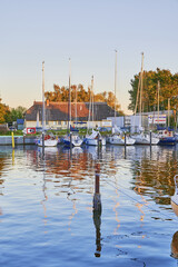 Sticker - GREIFSWALD, GERMANY - Aug 31, 2020: Sailing idyll at Greifswald harbor in Germany.