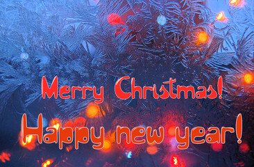 Merry Christmas and Happy New Year greetings on an abstract background