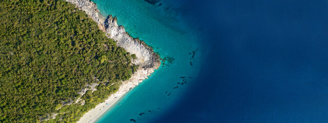 aerial drone ultra wide panoramic photo of tropical paradise deep turquoise lagoon with beautiful se