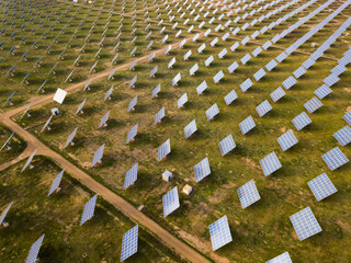 Aerial view of solar power station installed in green field