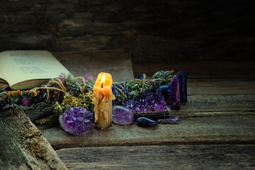 Sticker - Candle, floral cleansing bundles, gemstones minerals on dark rustic background. healing minerals for Magic Rock Ritual, Witchcraft, spiritual practice. Esoteric concept