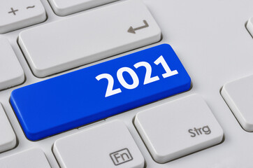 Wall Mural - a keyboard with a blue button - 2021