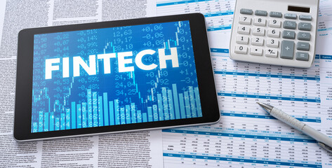 Wall Mural - a tablet with financial documents - fintech