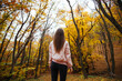 © Dimitar - Back view of a young female in the autumn park